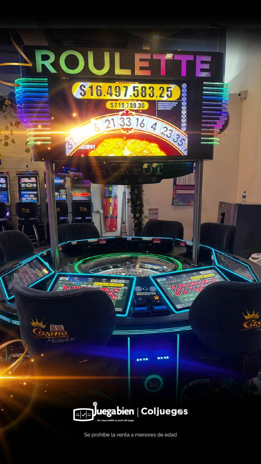 Ruleta electrónica con su letrero iluminado, la pantalla del jackpot y las pantallas táctiles de apuestas